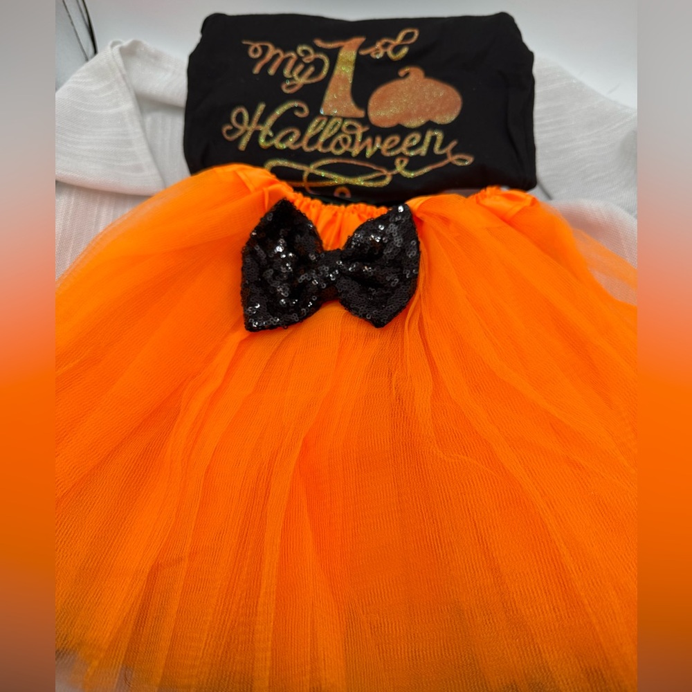 my first Halloween orange tulle skirt with black sequin bow & black onesie